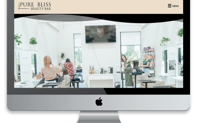 Pure Bliss Beauty Bar website on desktop computer
